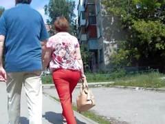 Follow big ass milf in red pants